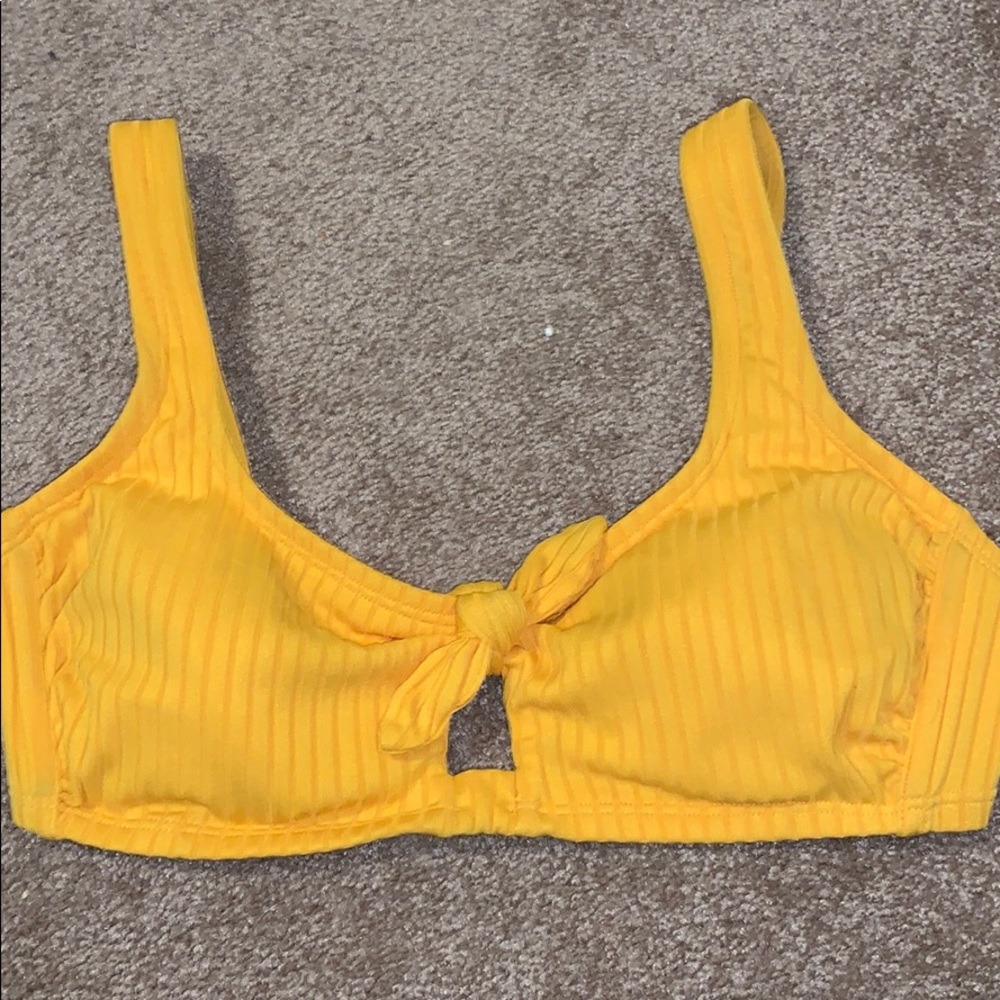 Yellow tied biking top